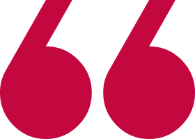 Red quotation marks on a black background.